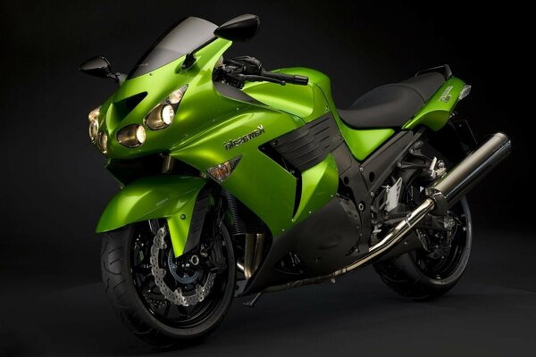 Green sport bike in the dark