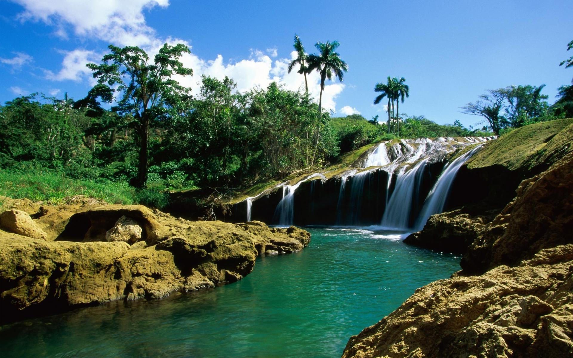 wasserfälle wasser tropisch reisen natur rock paradies urlaub sommer landschaft meer landschaft strand im freien landschaftlich ozean baum schön himmel türkis