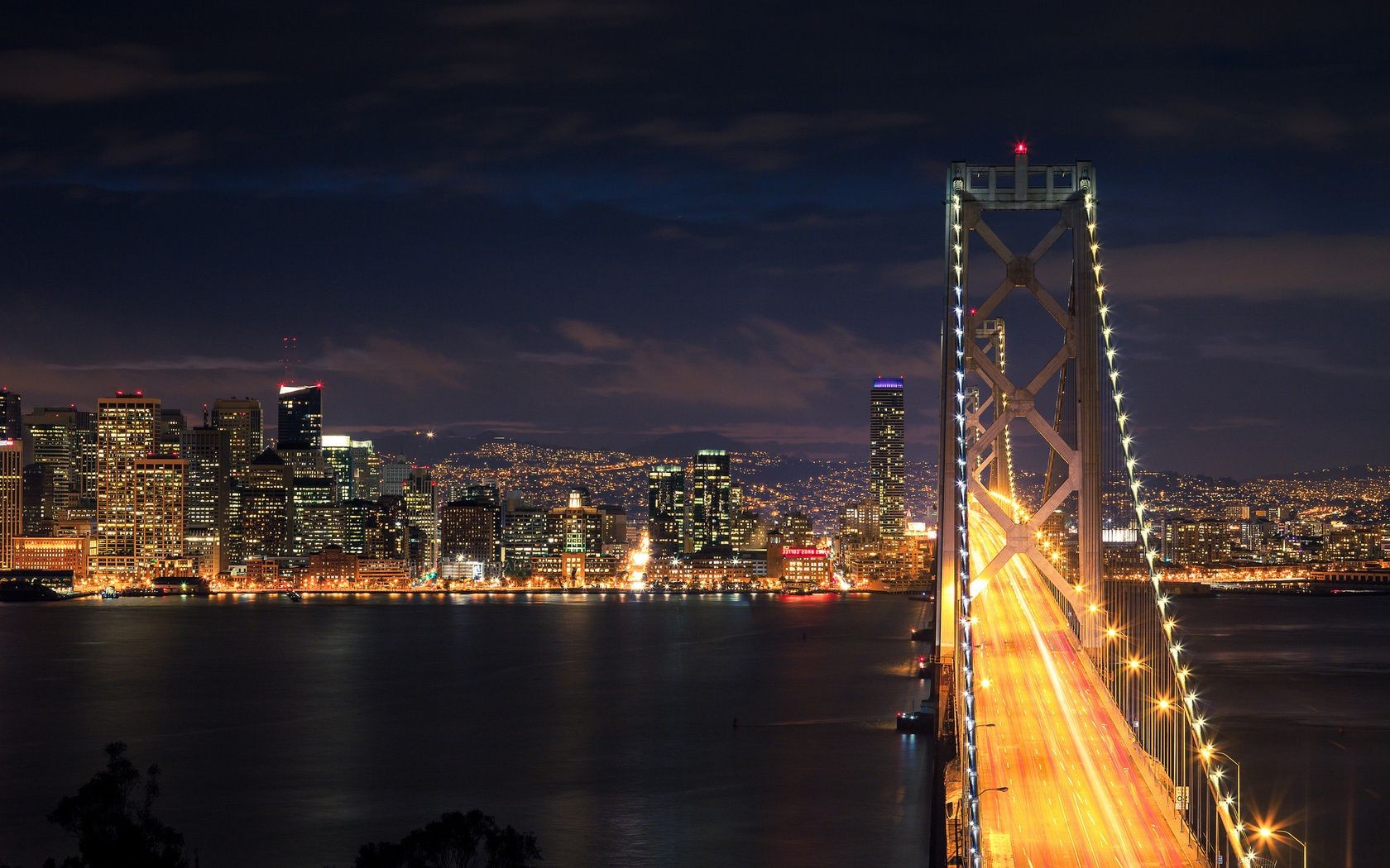 puentes puente ciudad agua puesta de sol crepúsculo río viajes arquitectura skyline noche centro de la ciudad ciudad cielo reflexión urbano puente colgante rascacielos luz torre