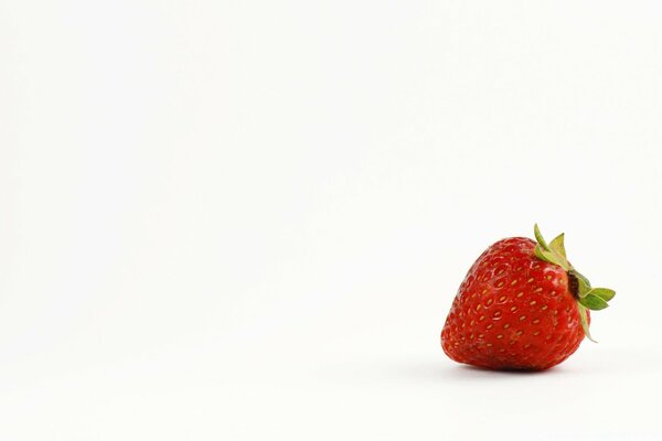 Red, juicy strawberries on a white background