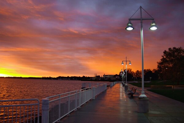 Embankment with lanterns after the rain at dawn