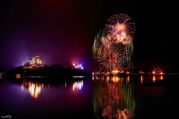 Fireworks in the evening on the seashore