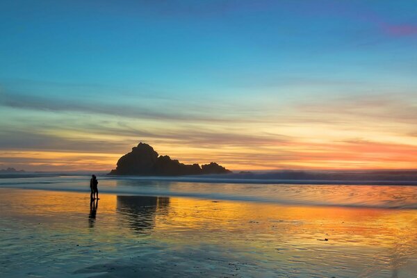 Rocks. Sunset. Couple. Love