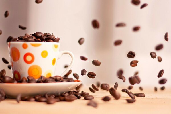 A mug filled with coffee seeds