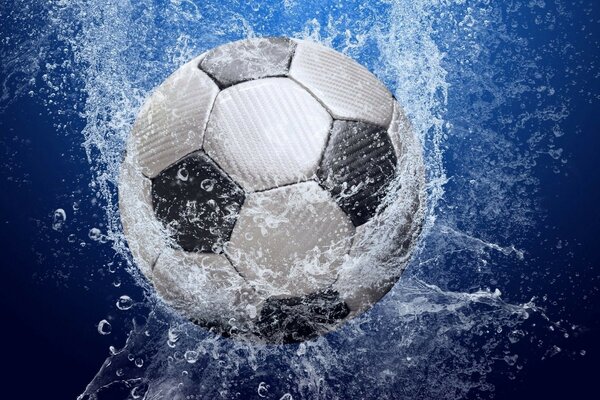 A soccer ball splashed with water