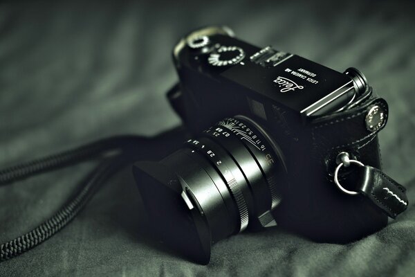 Photo camera. Sepia. Lens. Zoom