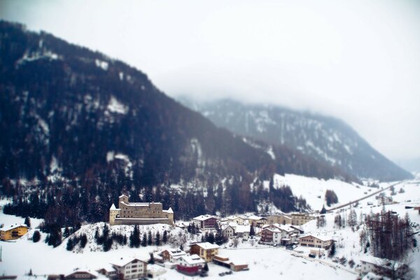 Kleinstadt Schnee Kurort Alpen Tilt-Shiftgebirge Winter