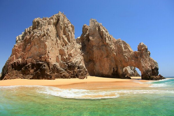 Sandy mountain island in the sea