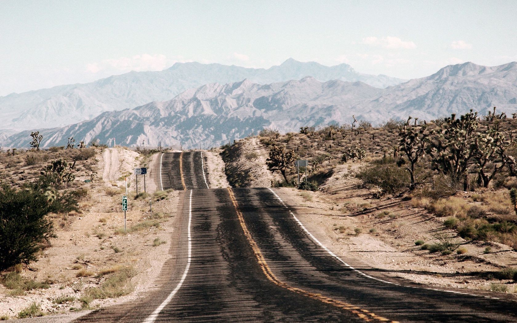 road landscape nature mountain travel sky outdoors scenic hill rock tree sight summer desert tourism