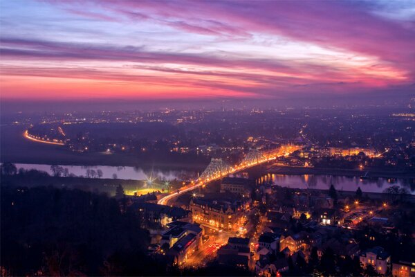 The gloomy city at sunset