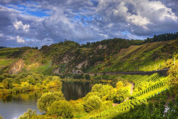 Landscape framed by green mountains