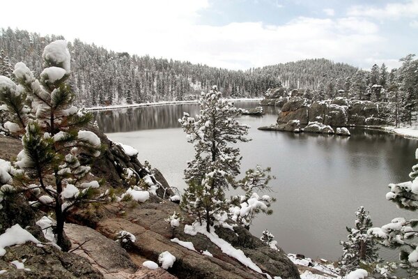 Cold lake in winter in the mountains