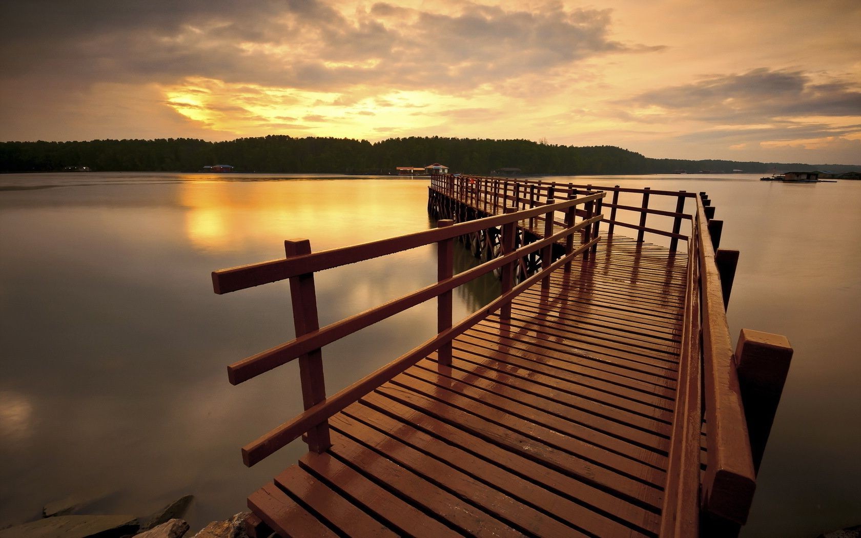 the sunset and sunrise water sunset dawn lake pier reflection beach sea landscape light dusk evening ocean sun boardwalk jetty travel river wood