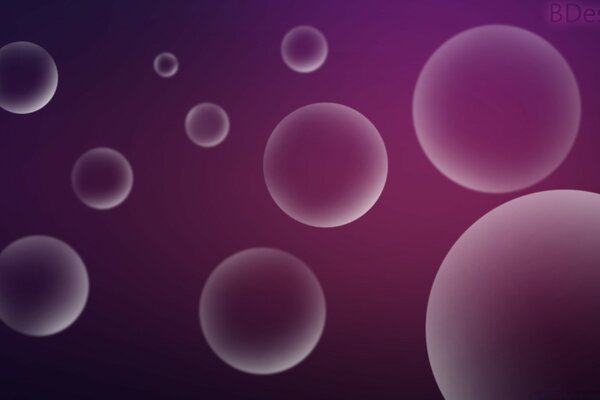 Transparent balls on a purple background