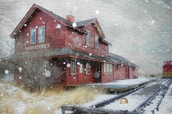 Vue de la maison, rails, train en hiver