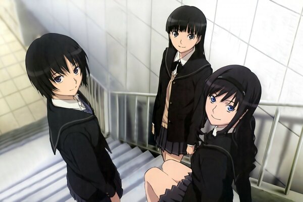 Tres colegialas de anime en las escaleras