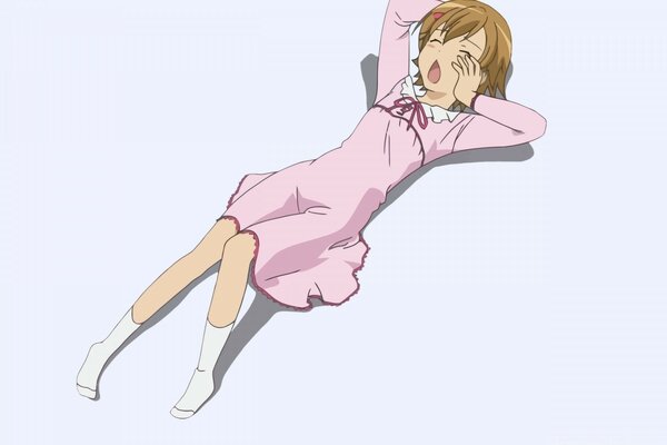 A girl in a pink dress lies and yawns anime