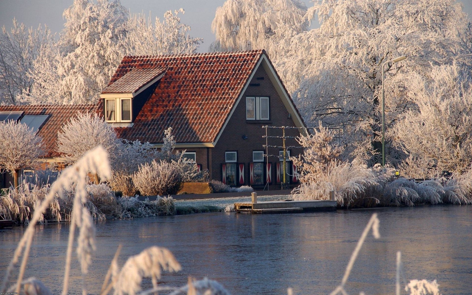 lake water house snow winter wood landscape reflection nature bungalow travel tree sky cold outdoors dawn building river