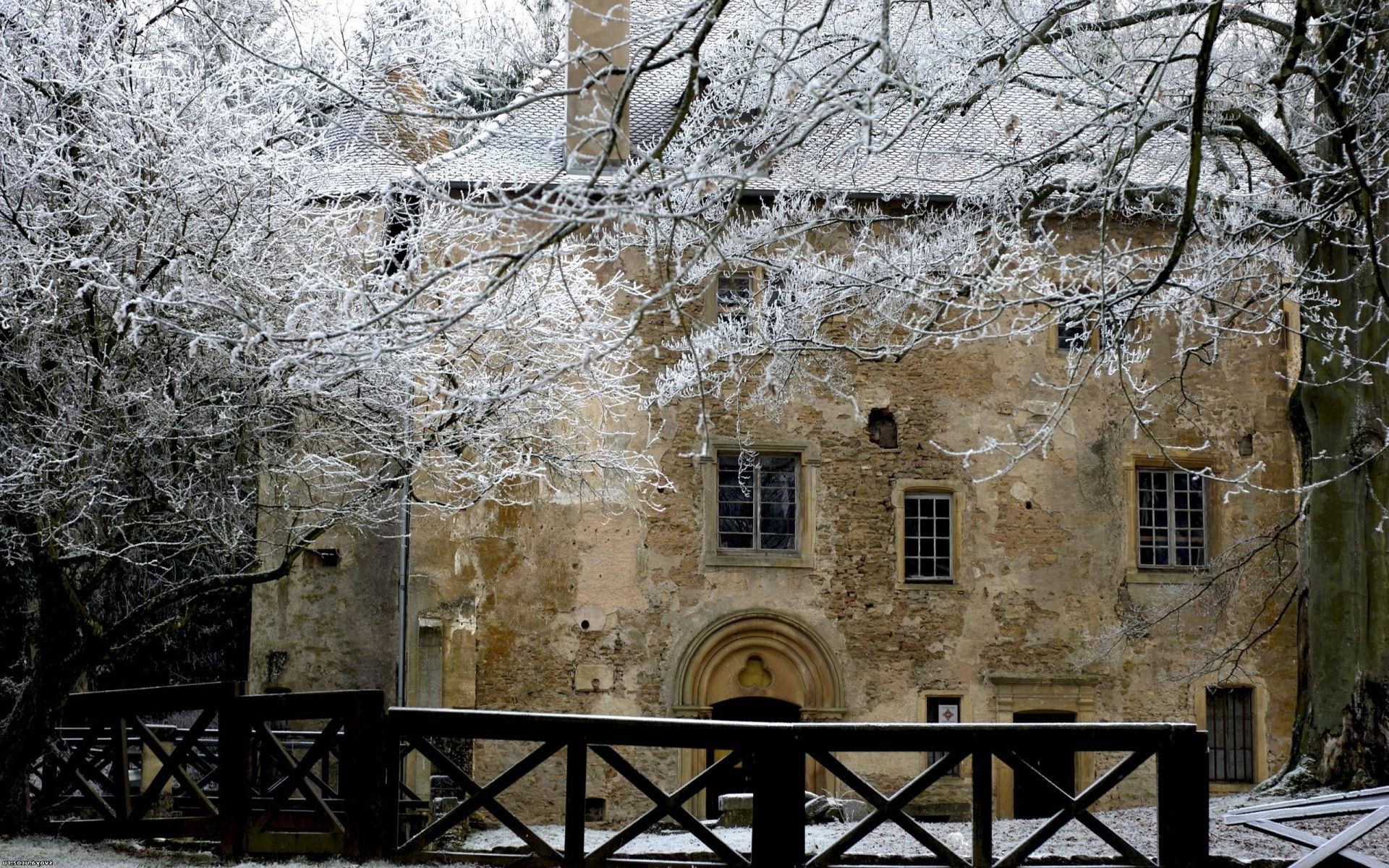 winter architecture old building wall stone house ancient window tree travel wood