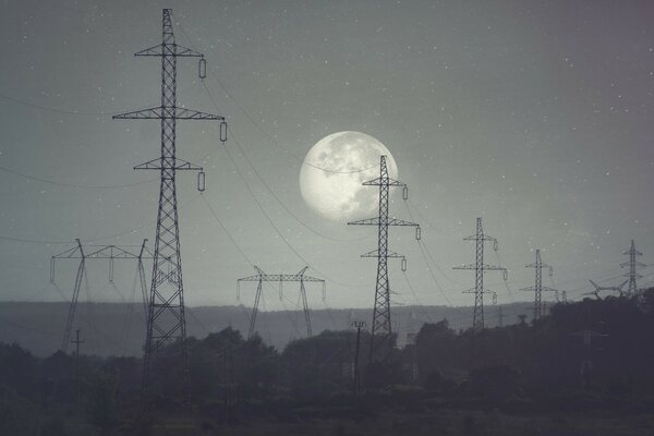 Poles conducting current on the background of a large moon