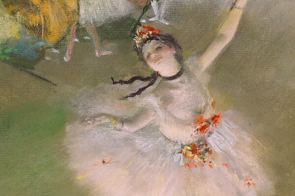 A young ballerina is spinning in a dance