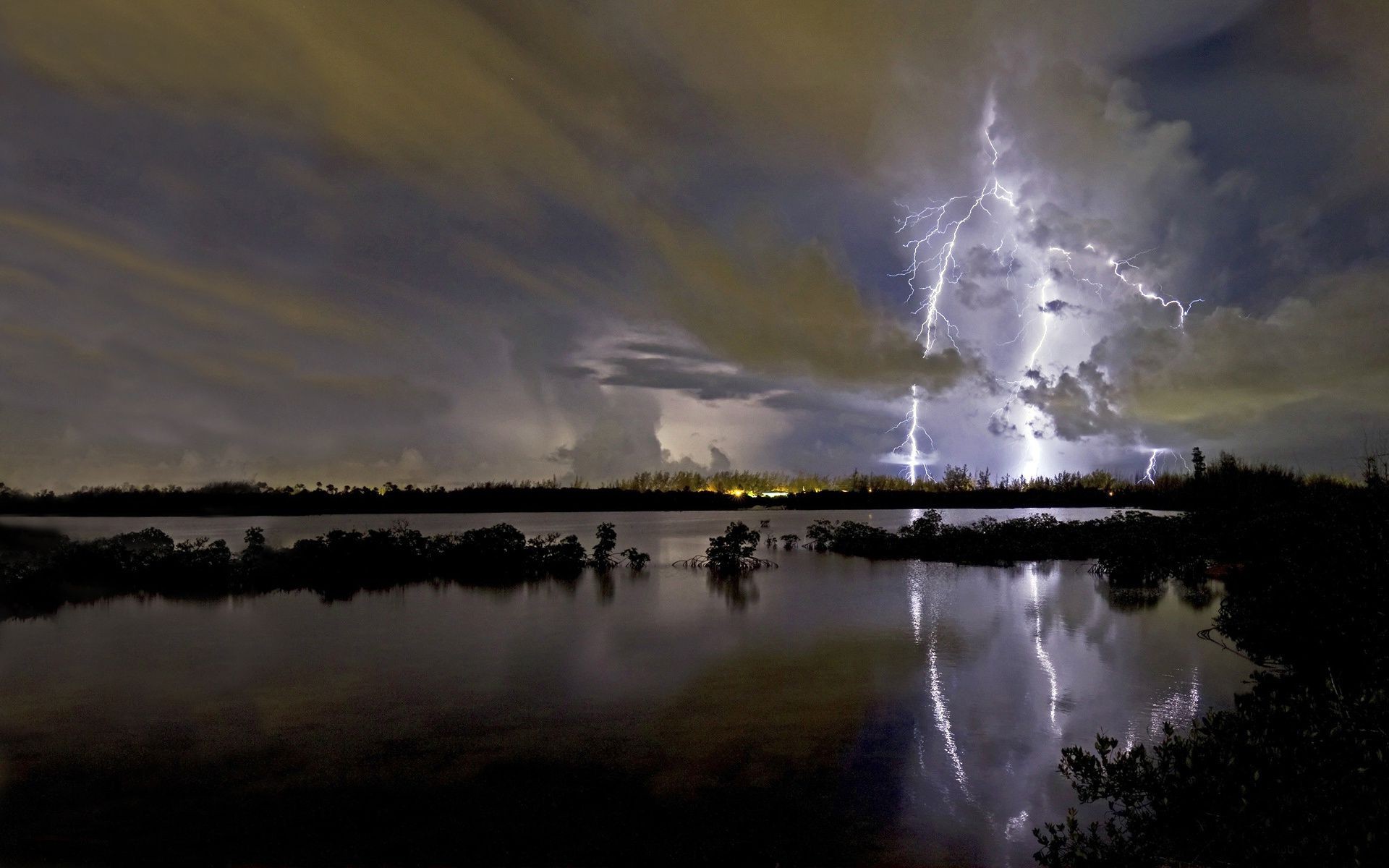 lightning landscape sunset water dawn storm lake sky reflection river nature weather evening sun rain outdoors light tree