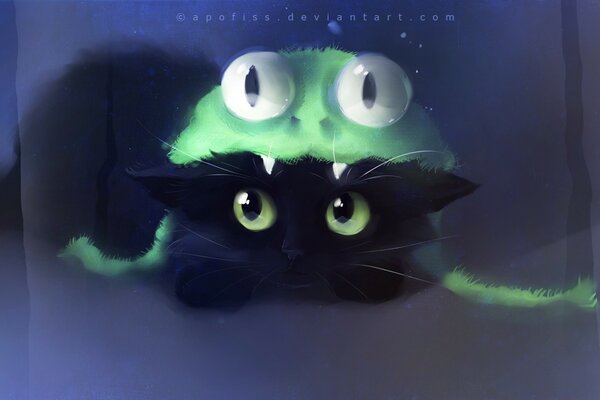 There is a green creature on a black kitten