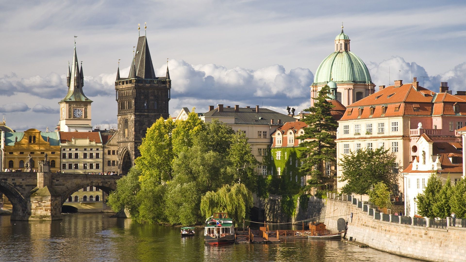 city architecture river travel building church cathedral old bridge sky water gothic castle town tourism tower sight outdoors cityscape