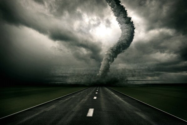 Hurricane on the highway horizon against a gray cloudy sky