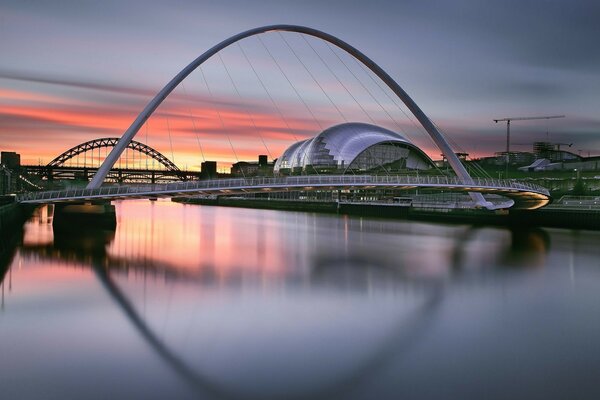 Bridges across the river on the background of sunset