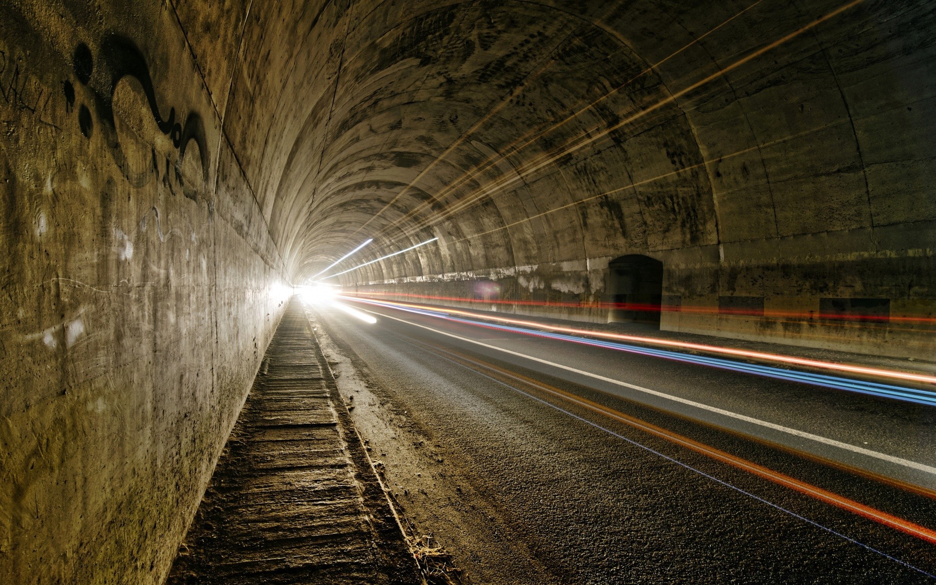 urban tunnel tube transportation system fast blur train long railway perspective dark light street road guidance traffic car travel motion