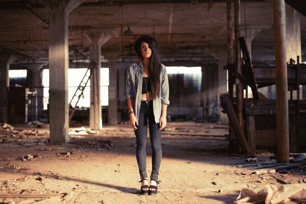 An abandoned building and a girl