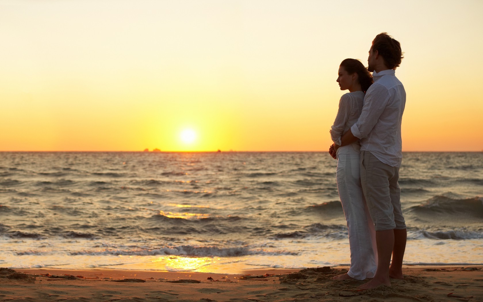 coppie innamorate tramonto acqua sole mare spiaggia romanticismo alba oceano estate crepuscolo sabbia bel tempo