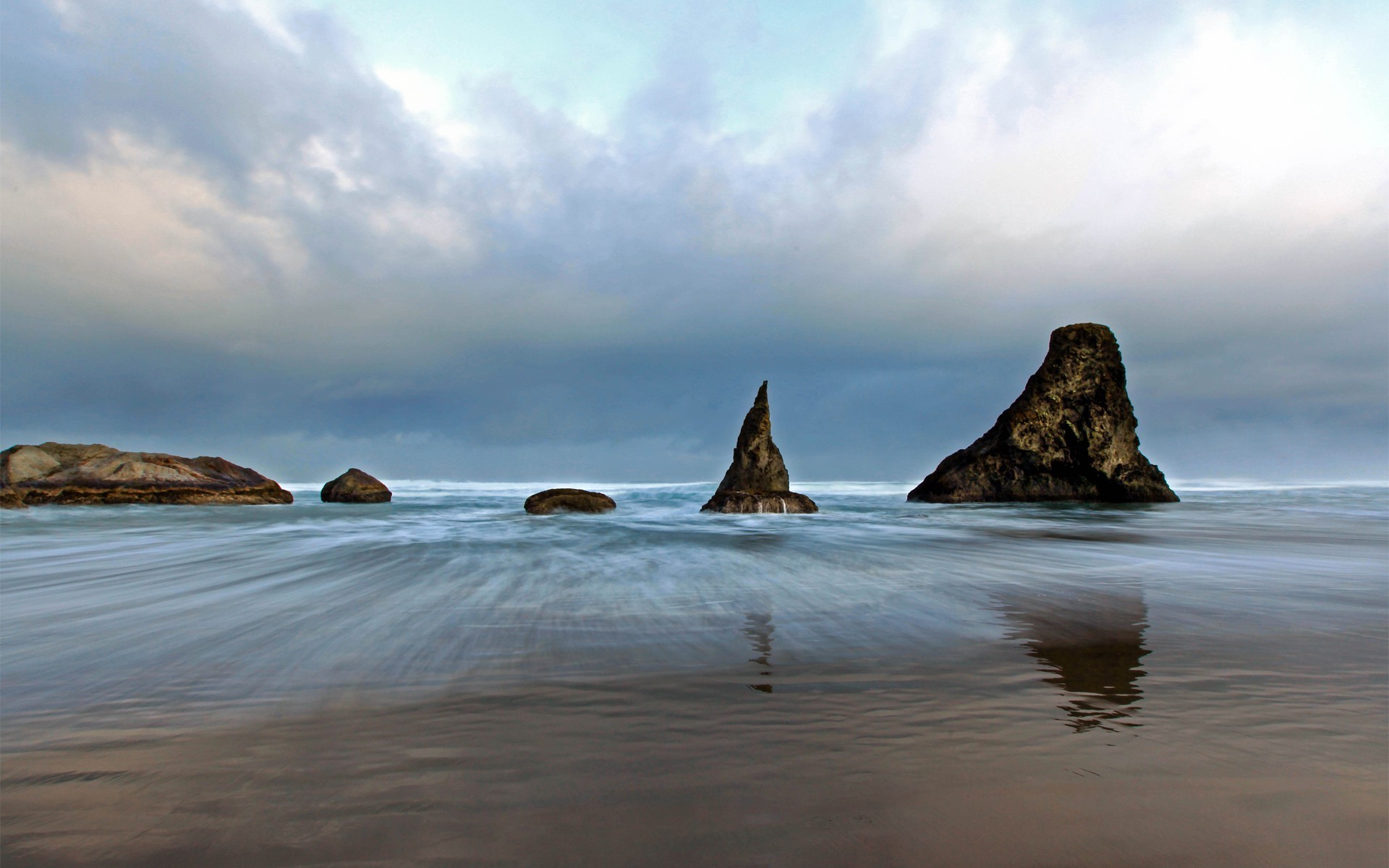 rocks boulders and stones water sunset sea ocean beach seashore evening landscape dawn dusk winter seascape sky travel snow outdoors rock surf