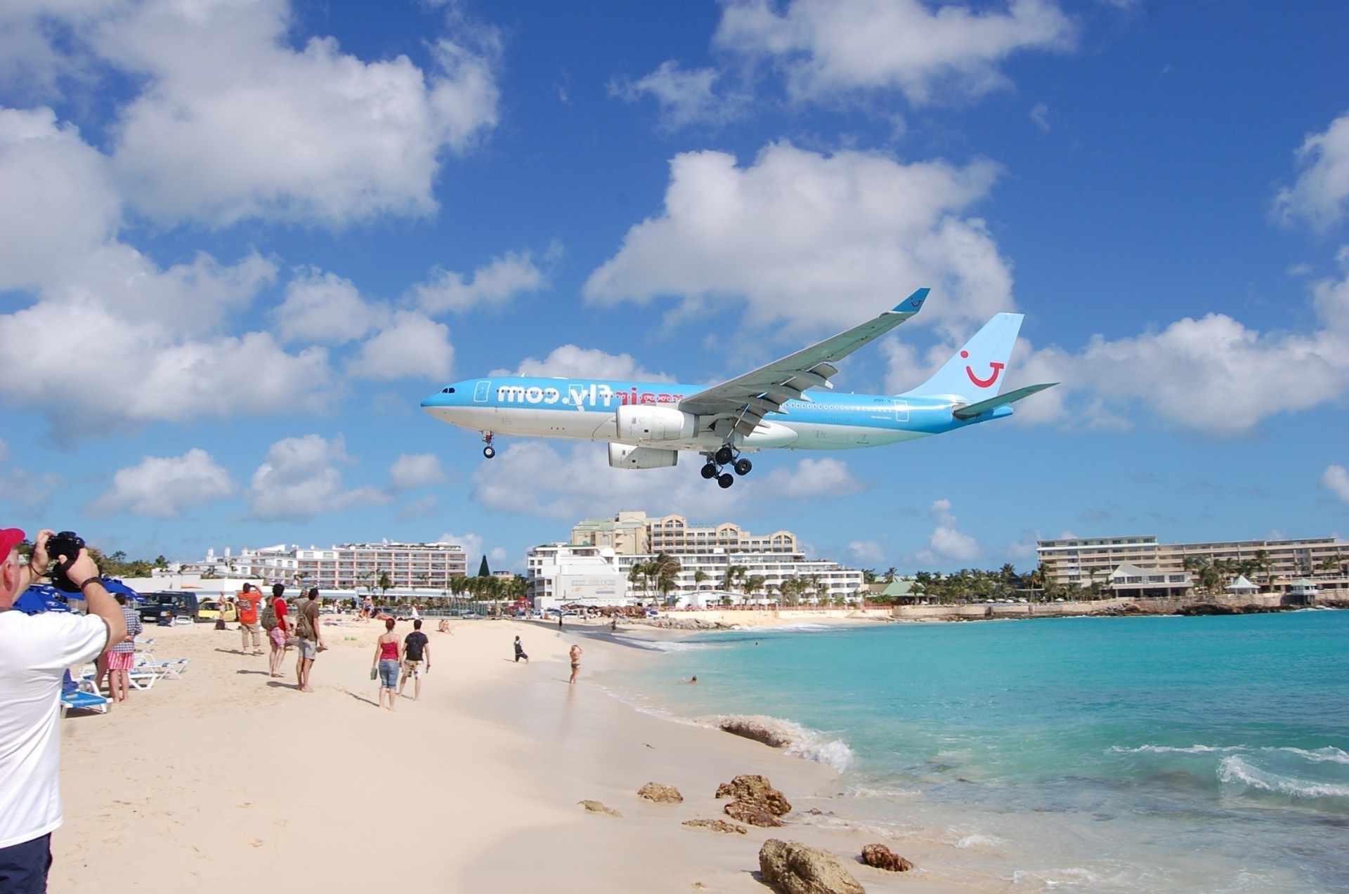 people travel airplane sky vacation beach water seashore aircraft tourism sea ocean transportation system sand vehicle summer