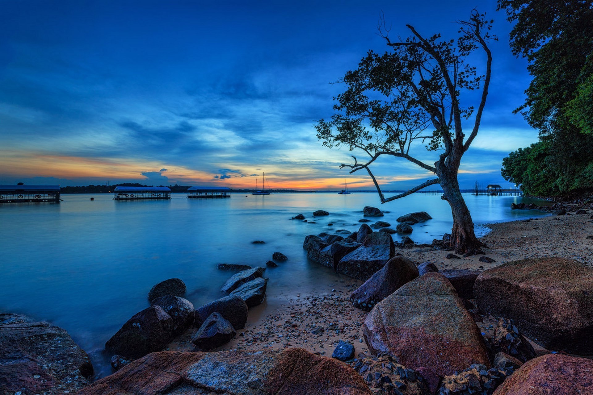 rocks boulders and stones water sunset travel evening seashore sky dusk landscape beach sea dawn ocean tree rock