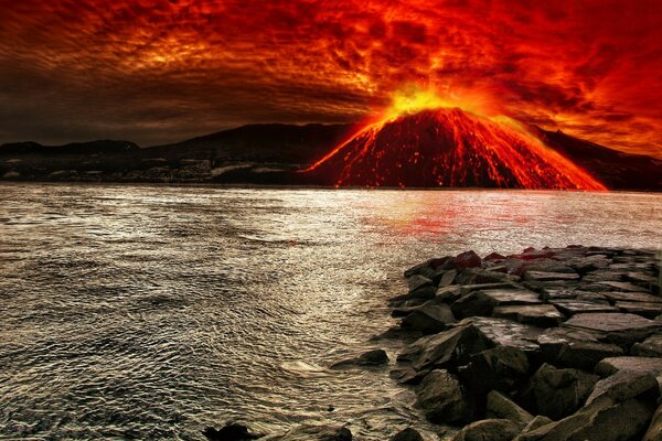 Volcanic eruption on the background of the ocean and rocks