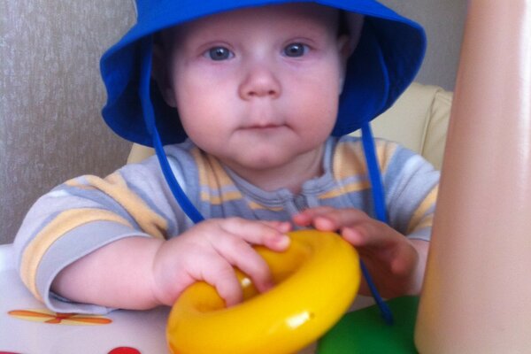 Kid in a blue panama hat, smart look