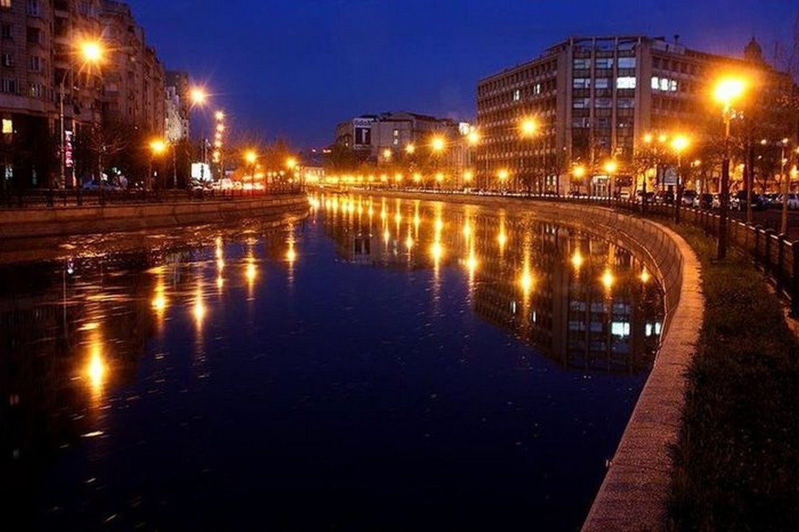 city water sunset dusk architecture bridge evening reflection river travel sky building outdoors illuminated light canal urban cityscape dawn