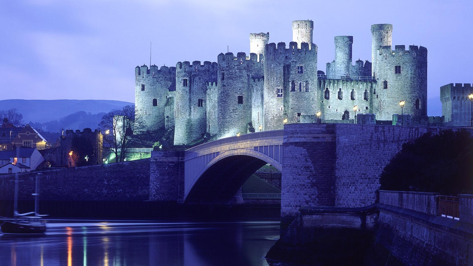 locks architecture castle gothic travel evening outdoors fortress tower fortification old water city dusk river building bridge sky