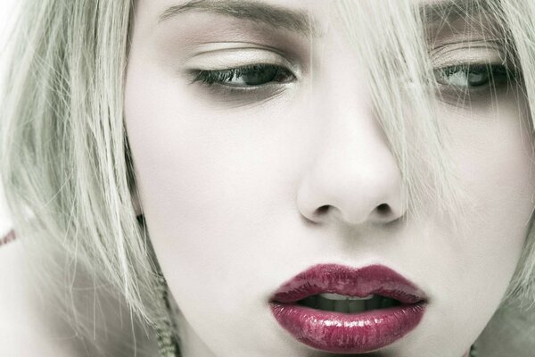 Blonde with brightly painted lips