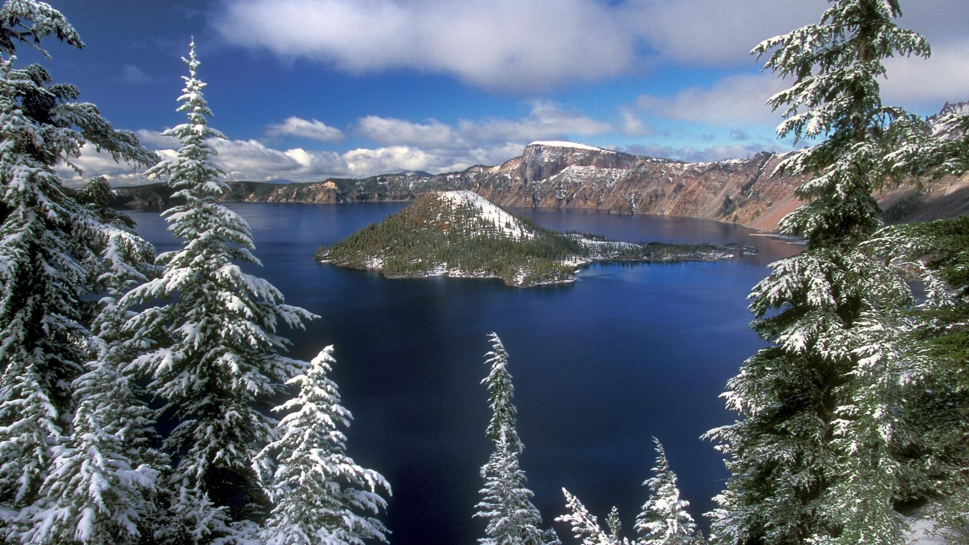 islands snow water winter wood landscape evergreen mountain conifer nature tree outdoors lake cold scenic travel ice sky pine