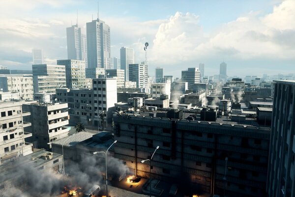 A skyscraper in the center of a smoking city