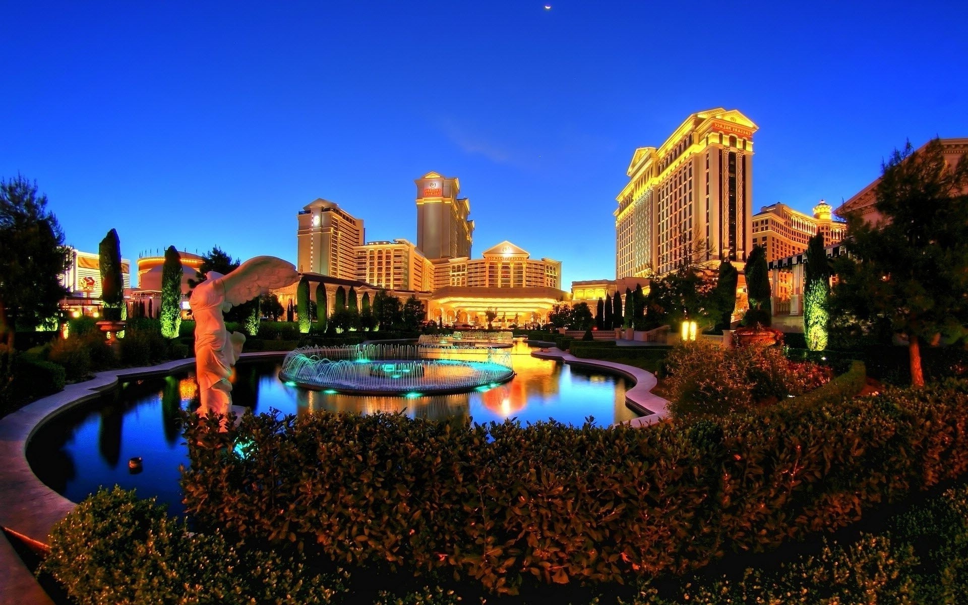 city travel architecture water evening dusk skyline downtown outdoors building cityscape fountain illuminated skyscraper hotel sunset casino sky urban