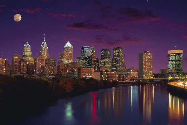 Evening metropolis on the background of sunset