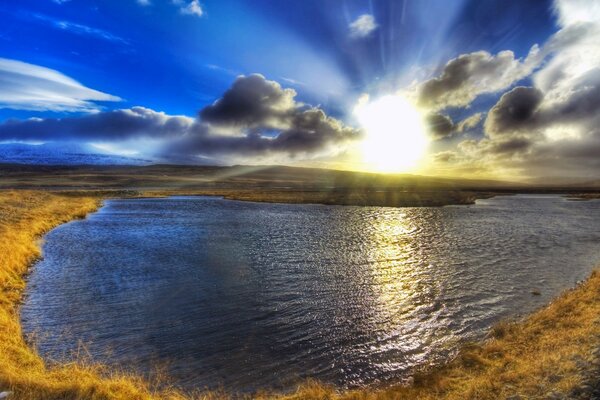 Lake sun water reflection