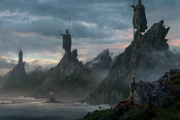 Huge statues on the background of mountains