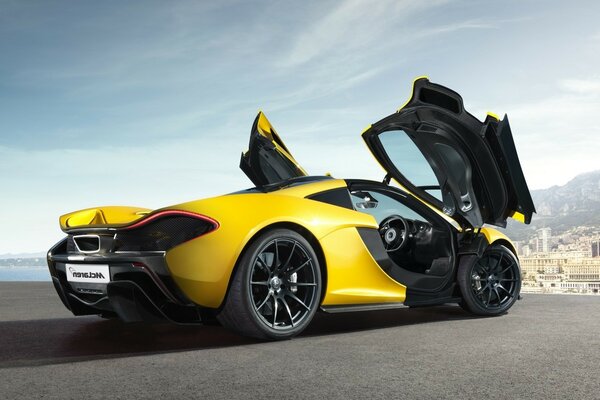 Sports yellow car with open doors