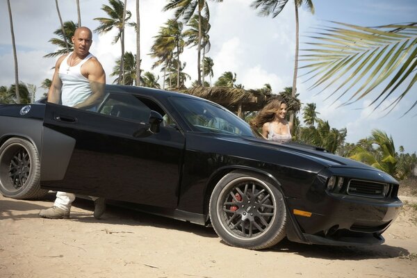 Black car on an abandoned beach