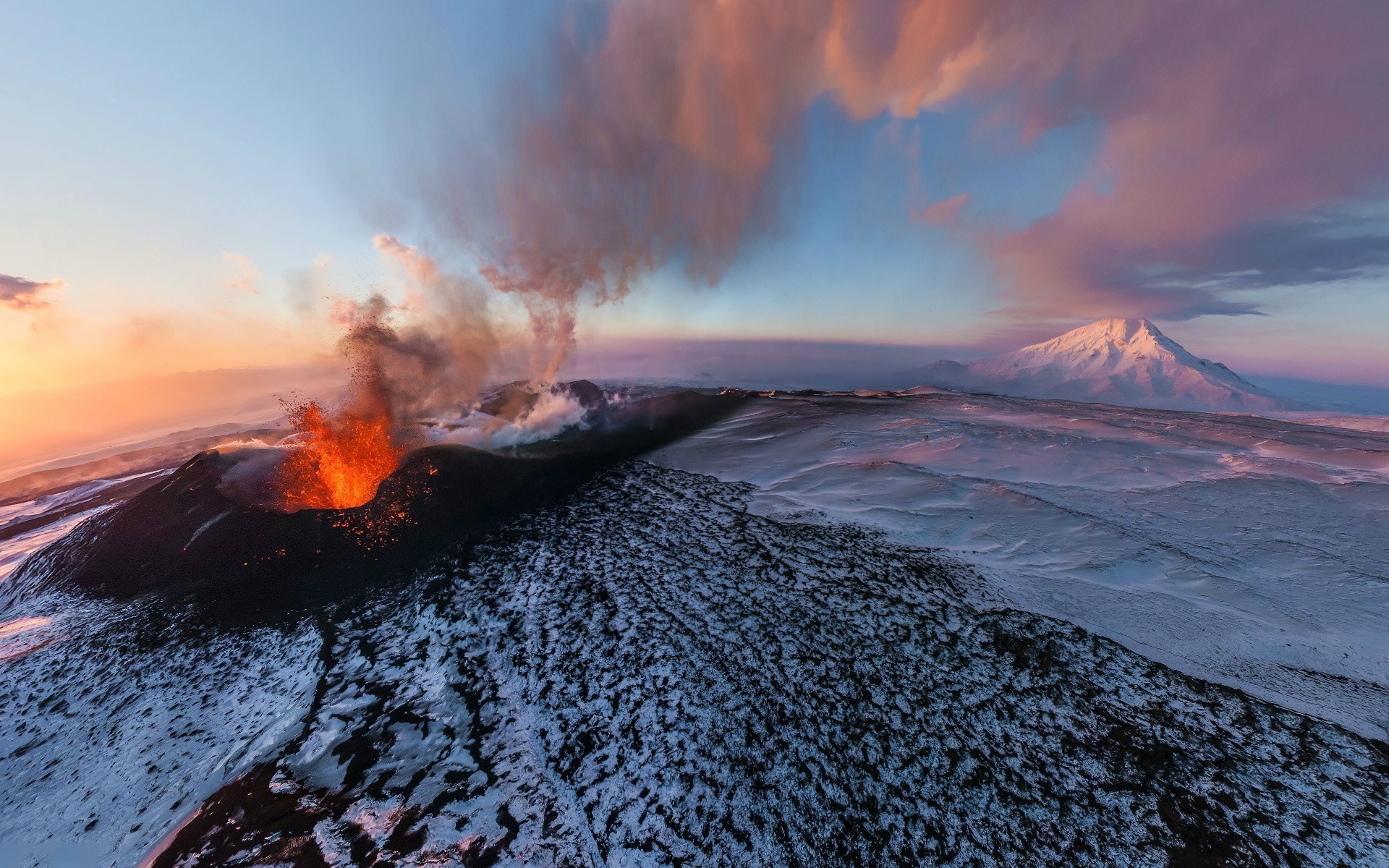 the volcano volcano sunset snow eruption landscape dawn water mountain outdoors winter evening steam smoke sky fog travel